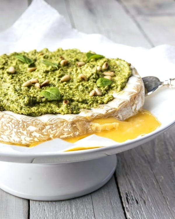 Baked Brie with Basil Pesto dressing P
