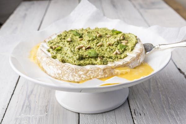 Baked-Brie-with-Basil-Pesto-dressing