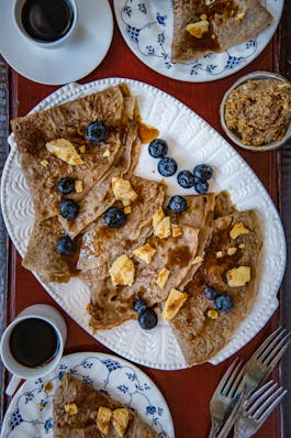 Coffee Crepes with Honeycomb butter and berries compressed